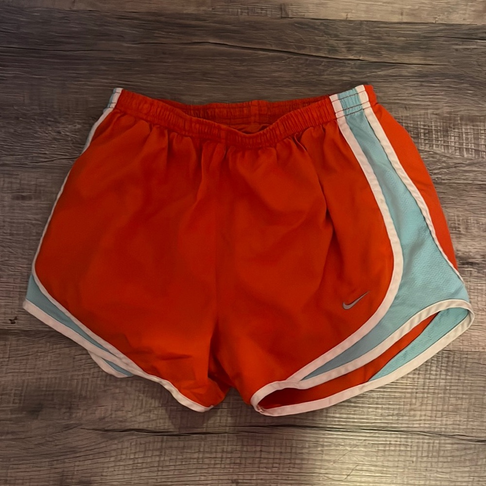 orange and blue nike athletic shorts